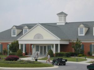 Commercial doors installed on a red brick building in Maryland by Quality Window & Door