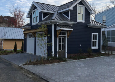 Exterior of 2 car garage with new double-hung windows