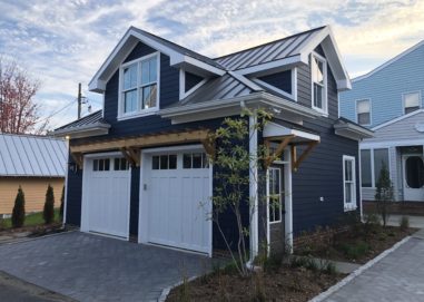 Exterior of garage with double hung windows