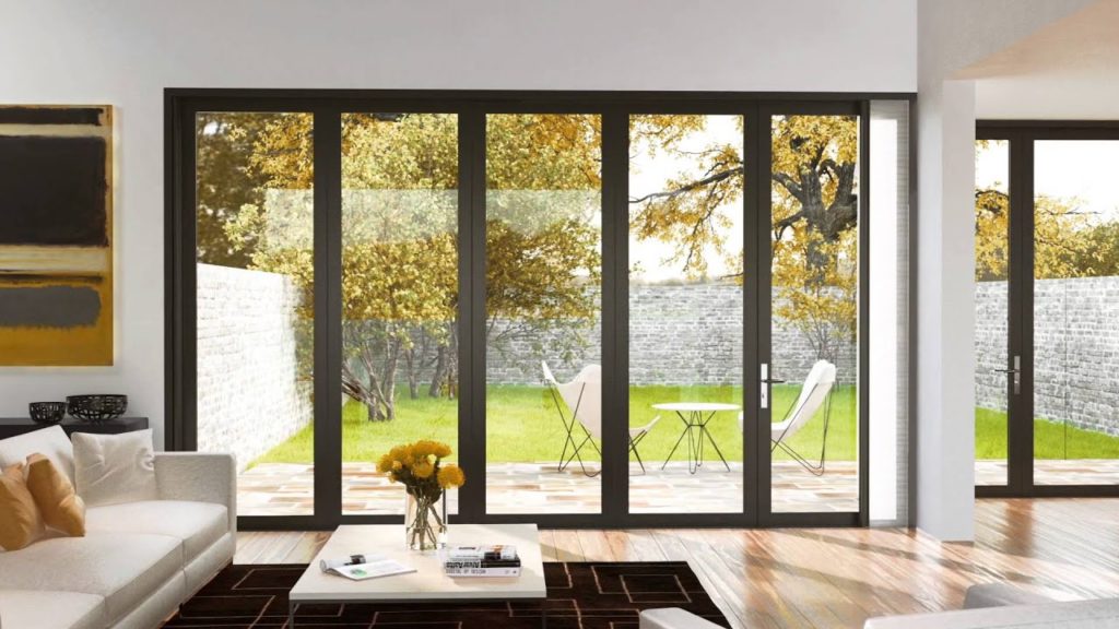 Modern living room with large windows.